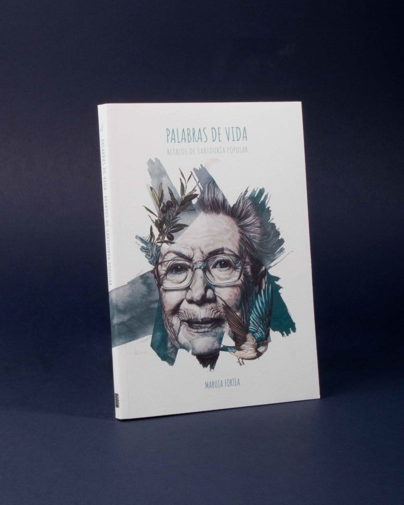Libro "Palabras de vida" de María Fortea, en la imagen se ve la portada con un ratrato suyo dibujado sobre una mancha de acuarela y una golondrina.