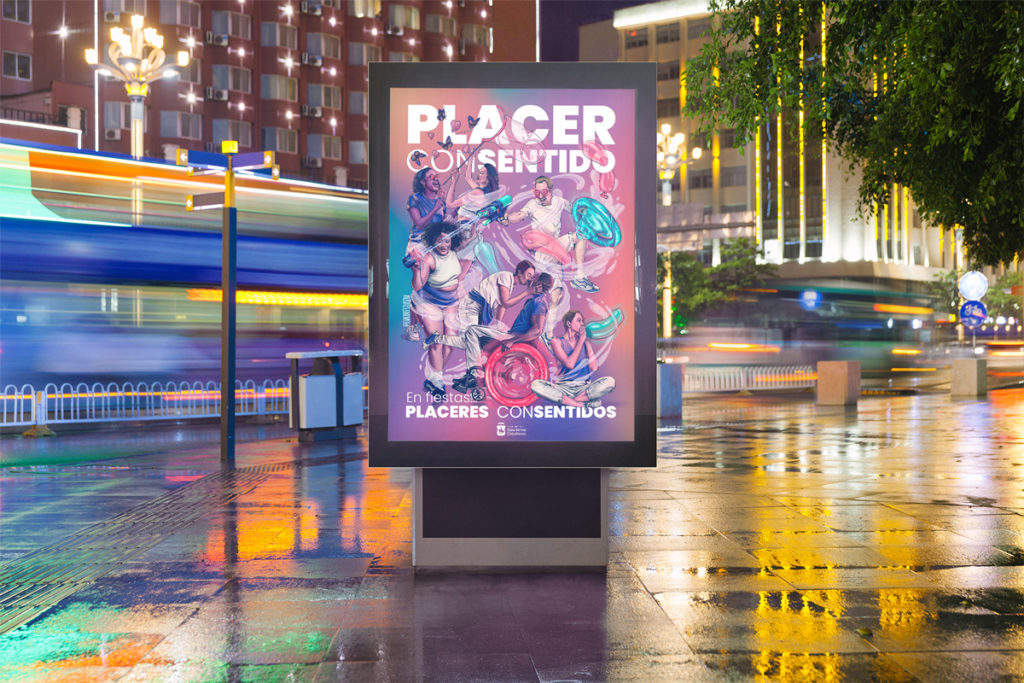 En la imagen se ve expuesto el cartel principal de este proyecto en un mupi urbano, se observa parte de la calle y en el centro la valla publicitaria (mupi). En él se ve el cartel ilustrado por Eva Cortés Ilustra, campaña cuyo lema principal es "Placer ConSentido" impulsado por el Ayuntamiento de Ejea de los Caballeros